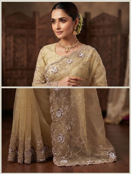Gold soft organza gold saree with ready made full sleeve blouse.